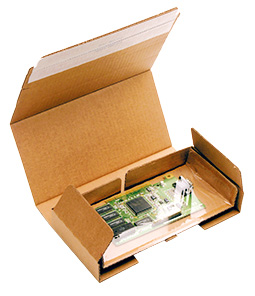Fixierverpackung mit hochflexibler PE- oder PU-Folie auf Wellpapp-Tray zur sicheren Fixierung von Produkten.