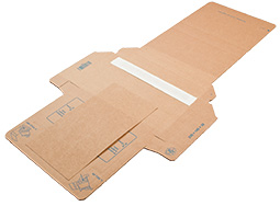 PAPERSNAP-Verpackung mit gespanntem Kraftpapier, das ein Produkt sicher fixiert.